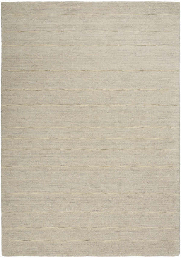 Close-up of the handmade Calvin Klein Halo Grey area rug. Neutral gray wool rug with subtle horizontal stripes.