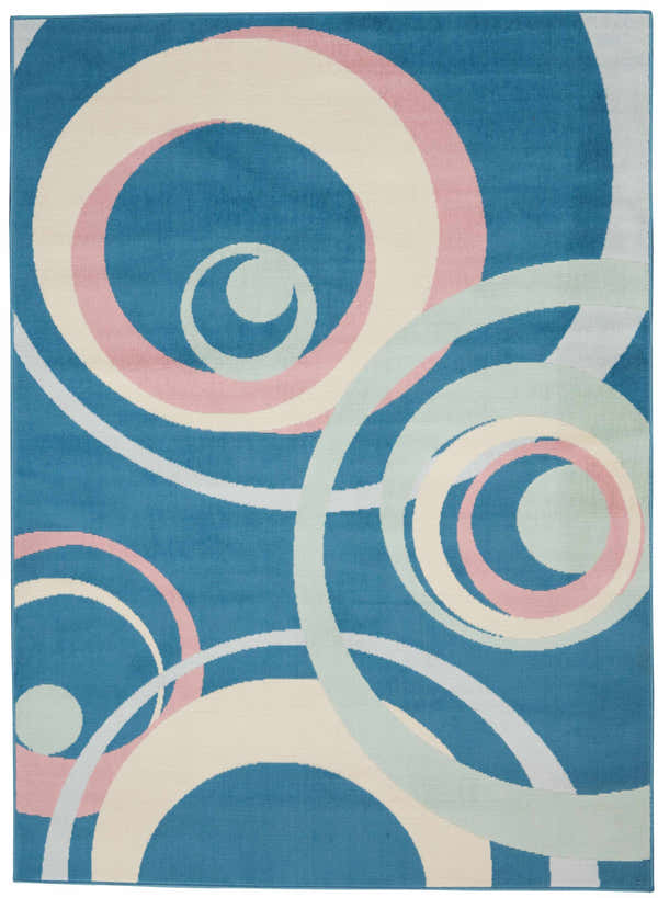 Close-up of the Nourison Grafix Blue Multicolor rug with a retro circle pattern in blue, pink, cream, and light green.