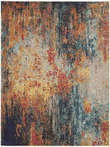 Close-up of the Nourison Celestial Multicolor area rug, featuring an abstract design with orange, blue, red, and gold tones.