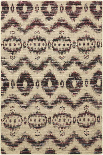 Close-up of the Nourison Spectrum Beige Black rug showing its ikat-inspired geometric pattern and woven texture.