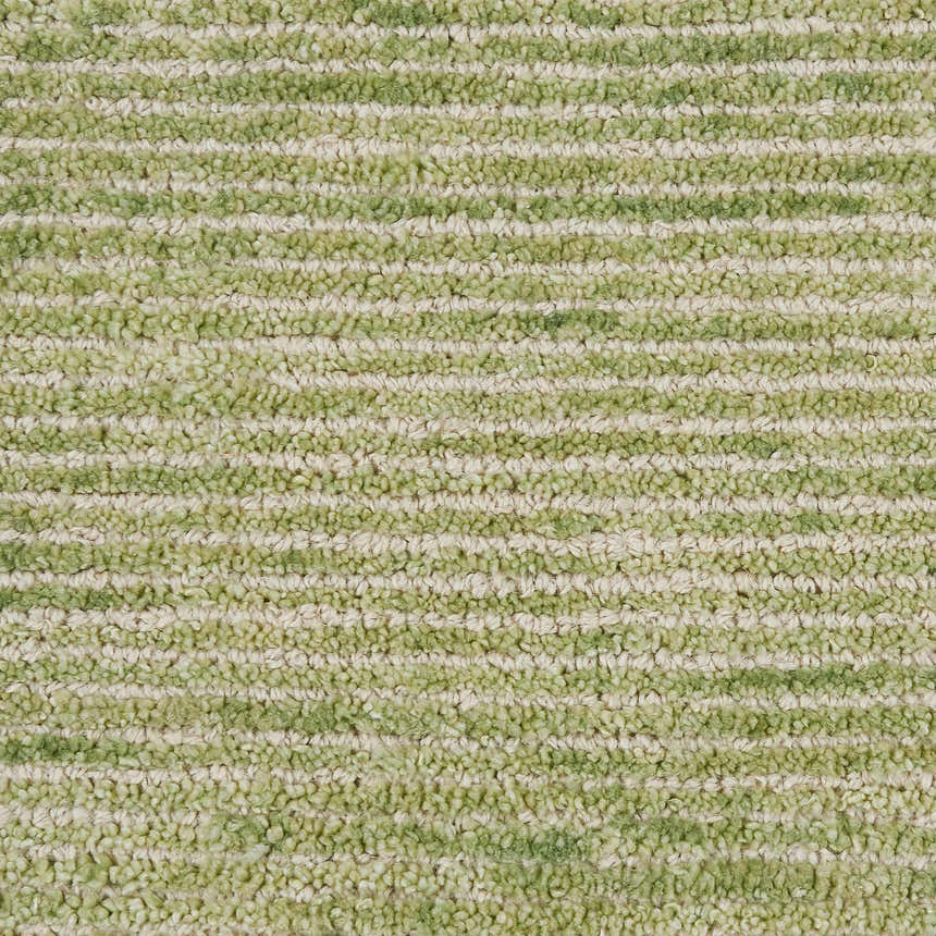 Close-up of the Nourison Weston Citron Rug. Shows the bamboo-silk like fiber and horizontal striped pattern.