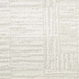 Close-up of the Nourison Dew Beige Rug, showcasing its low pile texture and subtle geometric pattern.