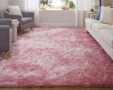 Living room scene with gray chairs, white sofa, and Feizy Indochine blush pink area rug. Roomscene-Rectangle