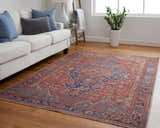 Living room with Feizy Rawlins Red/Tan/Blue Washable Area Rug, white sofa, blue pillows, wood floors, and bright natural light. Roomscene-Rectangle