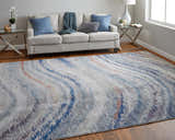 Living room with Feizy Edgemont rug in blue, gray, and orange. Modern abstract design complements the casual setting. Roomscene-Rectangle