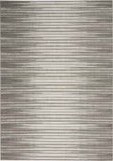 Close-up of the Nourison Key Largo Light Grey rug, featuring a contemporary horizontal stripe pattern and subtle texture.