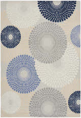 Close-up of the Nourison Aloha Blue Grey Modern Area Rug featuring a floral burst pattern in blue, gray, and ivory.