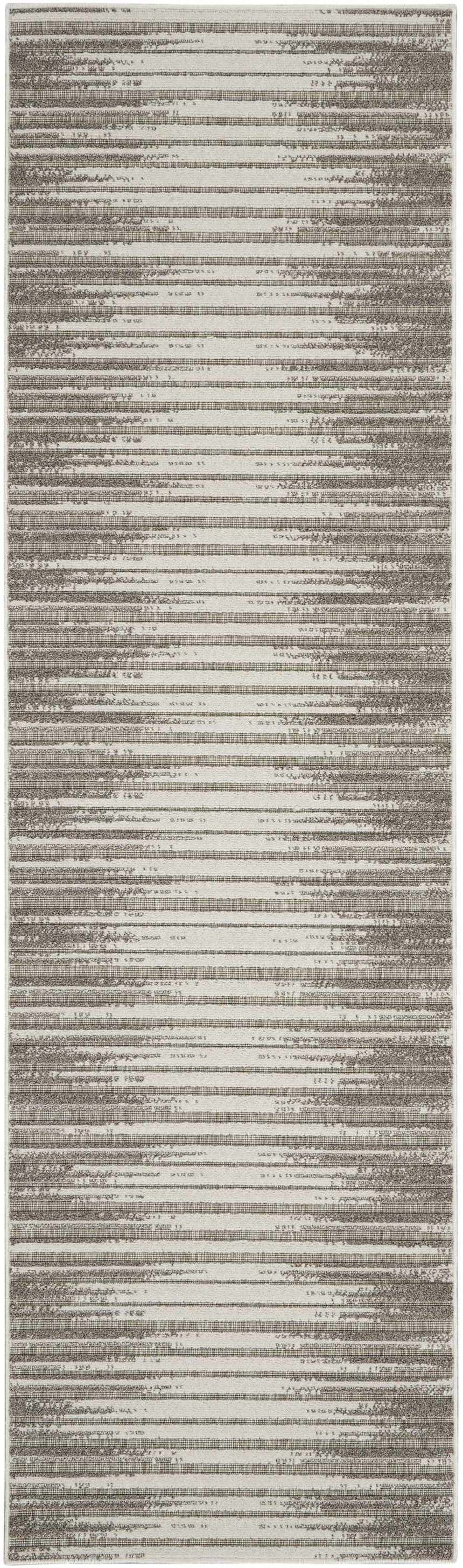 Close-up of the Nourison Key Largo Light Grey rug. Contemporary style with horizontal stripe pattern and subtle texture.