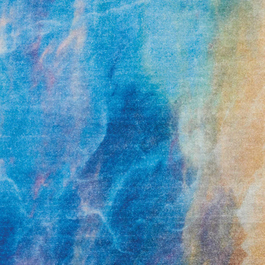 Close-up of the Nourison Le Reve Multicolor rug featuring a blend of blue, beige, and neutral hues.