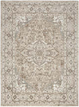 Close-up of the Nourison Quarry Beige Vintage Area Rug. High pile rug with an ornate, distressed traditional pattern.