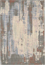 Close-up of the Nourison Artworks Multicolor rug, featuring a modern abstract design in blue, gray, cream, and terracotta.