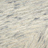 Close-up of the textured DKNY Pure Angles Grey rug. Handmade pile with a subtle, modern design.