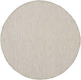 Close-up of round Nourison Courtyard Ivory Silver rug. Woven polypropylene texture in neutral ivory and silver tones.