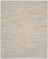 Close-up of the Nourison OCEAN Sand area rug. Sandstone color, handmade, with a subtle horizontal striation pattern.