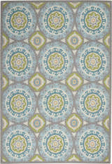 Close-up of Waverly Sun N' Shade Jade rug, showcasing a coastal-inspired medallion pattern in jade, blue, and gray tones.