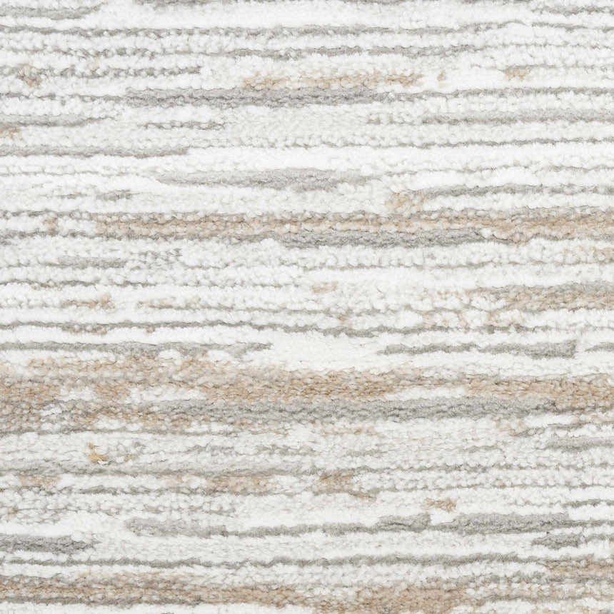Close-up of the Nourison Dew Silver Beige Rug, featuring a textured low pile and horizontal beige and silver stripes.