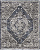 Close-up of the Nourison American Manor Blue Farmhouse Area Rug featuring a diamond pattern and distressed design.