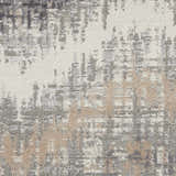 Close-up of the high-pile Nourison Elation rug in grey, ivory, and chestnut. Abstract, mid-century modern design.