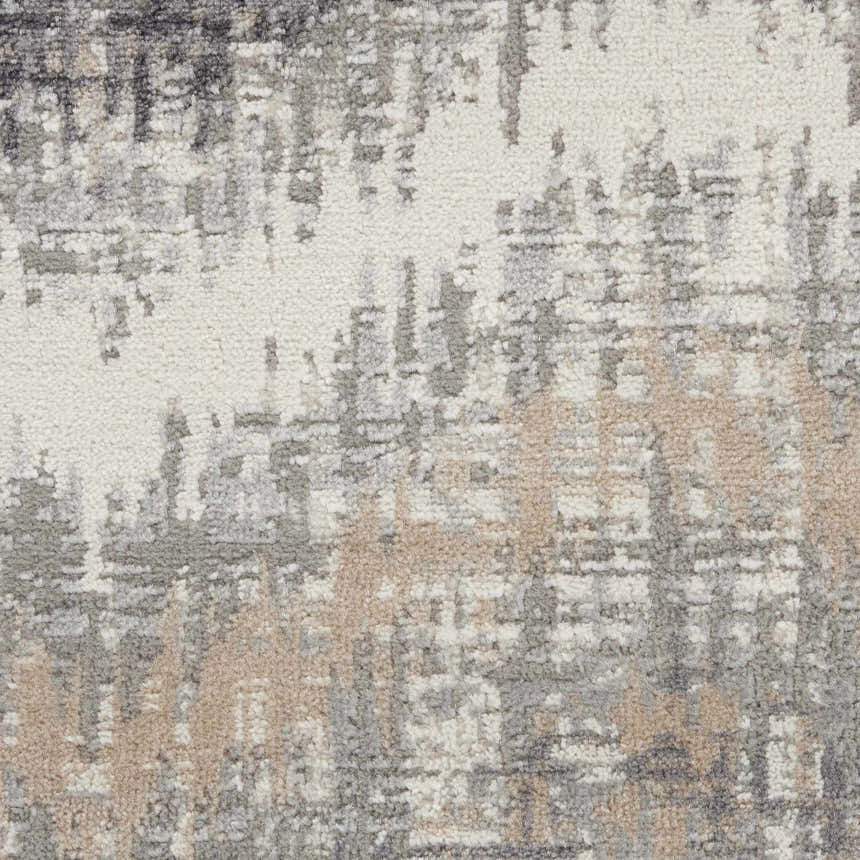 Close-up of the high-pile Nourison Elation rug in grey, ivory, and chestnut. Abstract, mid-century modern design.