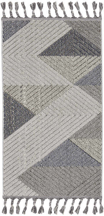 Close-up of Nourison Paxton Grey Slate rug. Modern geometric design in slate gray tones with braided tassel fringe.