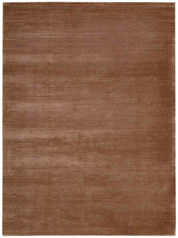 Close-up of the handmade Calvin Klein Home Lunar Foal rug, featuring a subtle horizontal line pattern and soft foal brown color.