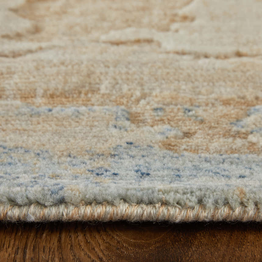 Close-up of Feizy Jaxson Tan/Brown/Gray Area Rug showing abstract pattern and textured pile. Pile