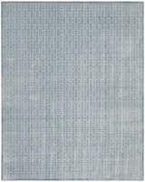 Close-up of Nourison Charm Blue Ivory rug featuring a modern geometric pattern.
