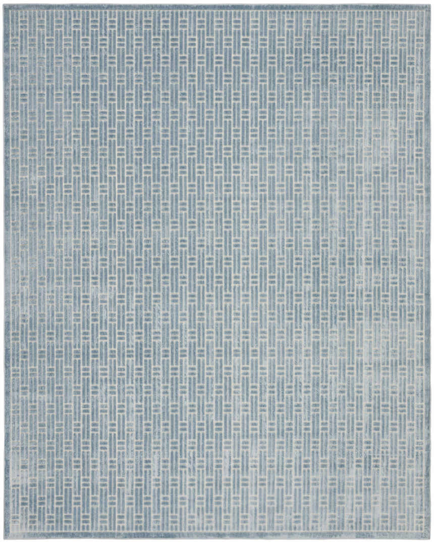 Close-up of Nourison Charm Blue Ivory rug featuring a modern geometric pattern.