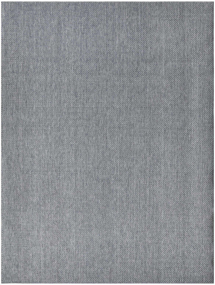 Close-up of the denim-colored Nourison Tulum Outdoor Area Rug, showing its woven texture.