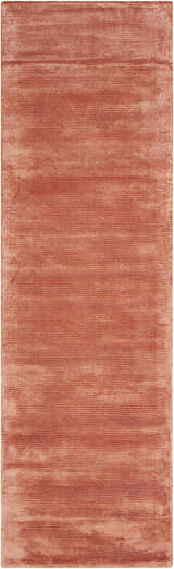 Close-up of the Calvin Klein Home Lunar Rust Indoor Area Rug, showing the textured horizontal pattern and rust color.