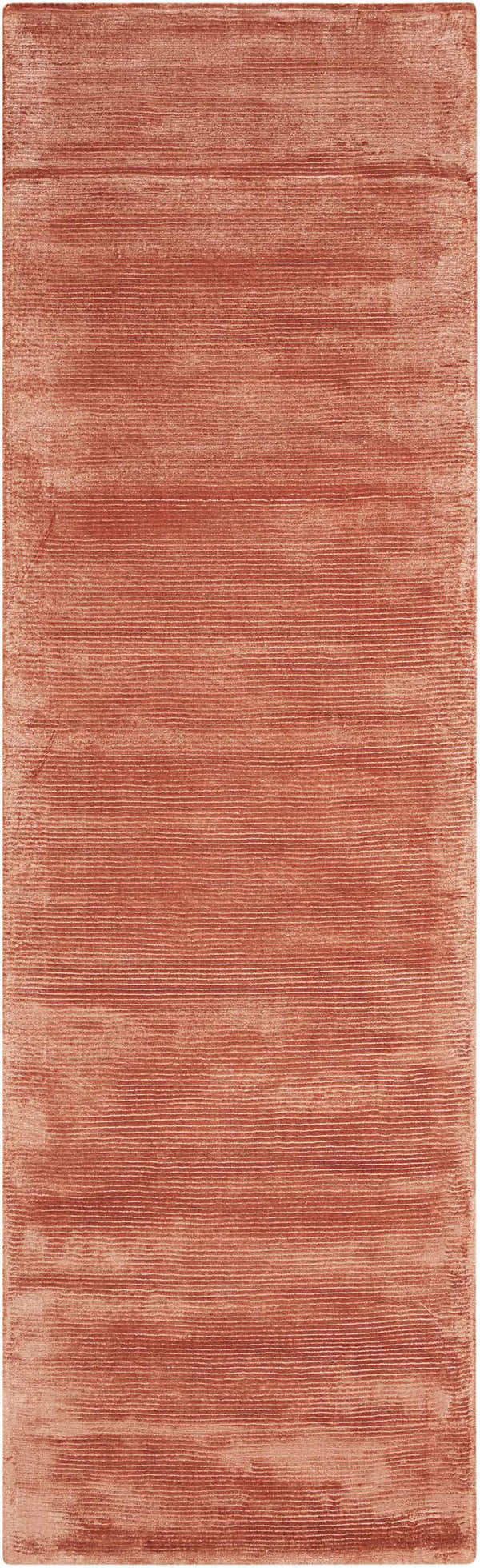 Close-up of the Calvin Klein Home Lunar Rust Indoor Area Rug, showing the textured horizontal pattern and rust color.