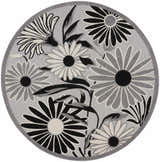 Close-up of round Nourison Aloha Black White Outdoor Area Rug with black, white, and gray floral pattern.