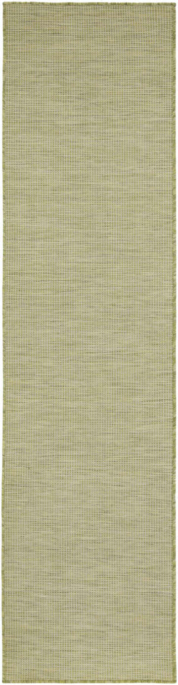 Close-up of the Nourison Positano Green Modern Area Rug. Shows a woven texture and subtle grid pattern.