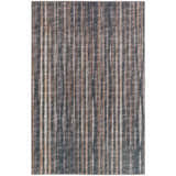 Close-up of the Dalyn Indoor/Outdoor Amador AA1 Fudge Area Rug. Features vertical stripes in brown, taupe, and light brown hues.