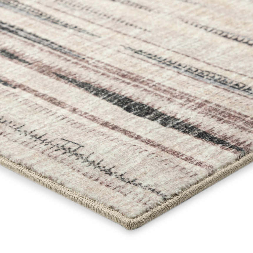 Close-up of the Dalyn Amador AA1 Ivory Area Rug, showing beige, brown, and black horizontal stripes and textured edge.