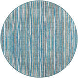 Close-up of round Dalyn Amador AA1 Sky Area Rug. Features vertical stripes in sky blue, taupe, and ivory.