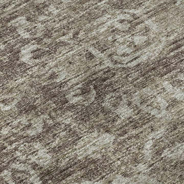 Close-up of Dalyn Aberdeen AB1 Fudge Washable Area Rug. Brown and taupe farmhouse style with a subtle traditional pattern.