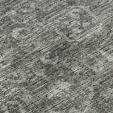 Close-up of the Dalyn Aberdeen AB1 Graphite Washable Area Rug, showing its textured pattern in graphite, gray, and taupe.