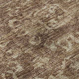 Close-up of the Dalyn Aberdeen AB1 Mink rug. The rug has a traditional pattern in mink, taupe, and shades of brown.