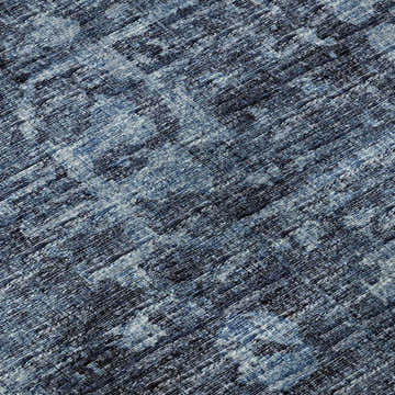 Close-up of Dalyn Aberdeen AB2 Baltic rug. Machine-made texture in shades of blue and taupe. Washable, indoor/outdoor rug.