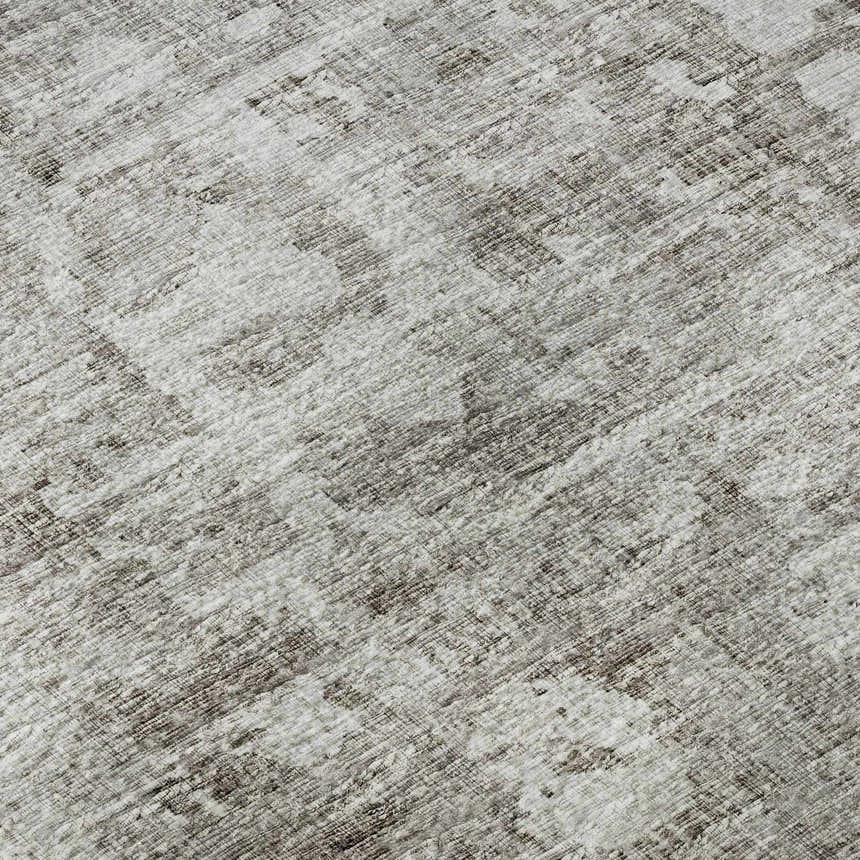 Close-up of the Dalyn Aberdeen AB2 Coffee Washable Area Rug. Features a farmhouse style pattern in coffee, taupe and shades of brown.