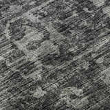 Close up of Dalyn Aberdeen AB2 Midnight Washable Area Rug. Textured black and taupe farmhouse style rug.