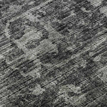 Close up of Dalyn Aberdeen AB2 Midnight Washable Area Rug. Textured black and taupe farmhouse style rug.