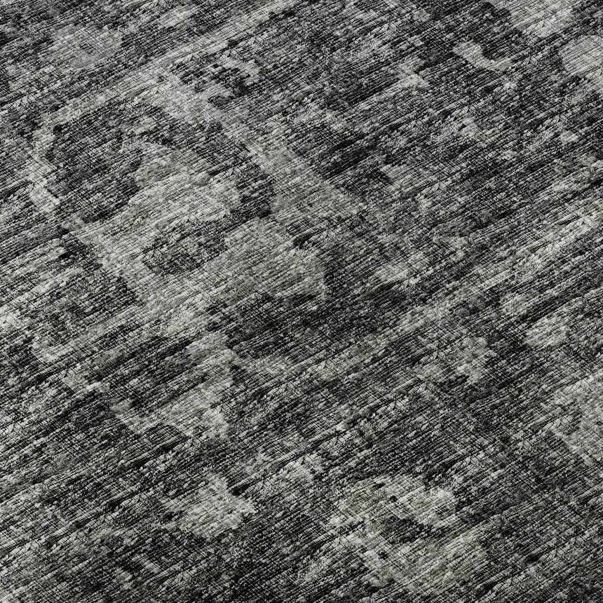 Close up of Dalyn Aberdeen AB2 Midnight Washable Area Rug. Textured black and taupe farmhouse style rug.