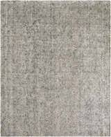 Close-up of the hand-loomed Abiba Area Rug. Beige and black wool and viscose rug with a subtle textured pattern. Design-Rectangle-810
