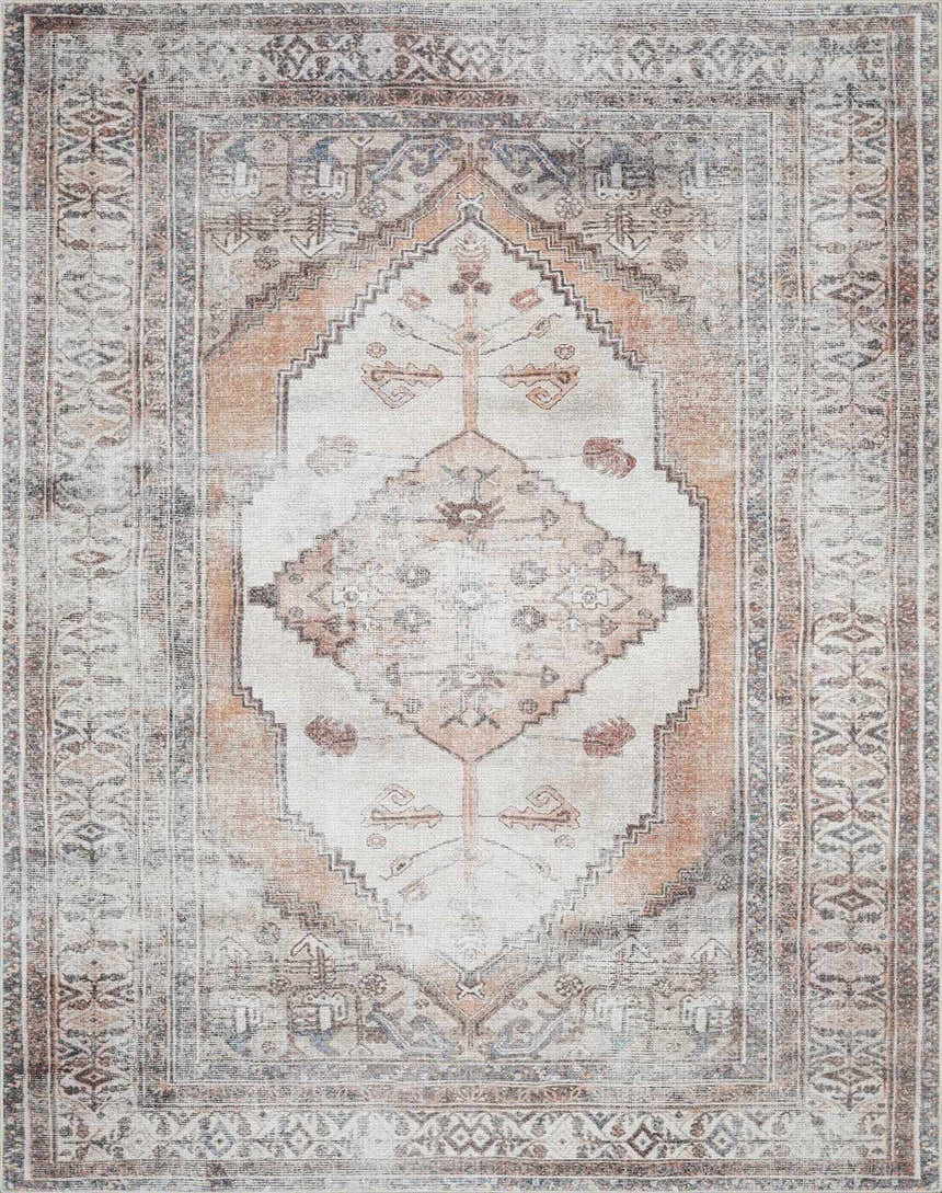 Close-up of Arncliffe Washable Area Rug with a traditional, bohemian pattern in shades of ivory, brown, and orange. Design-Rectangle