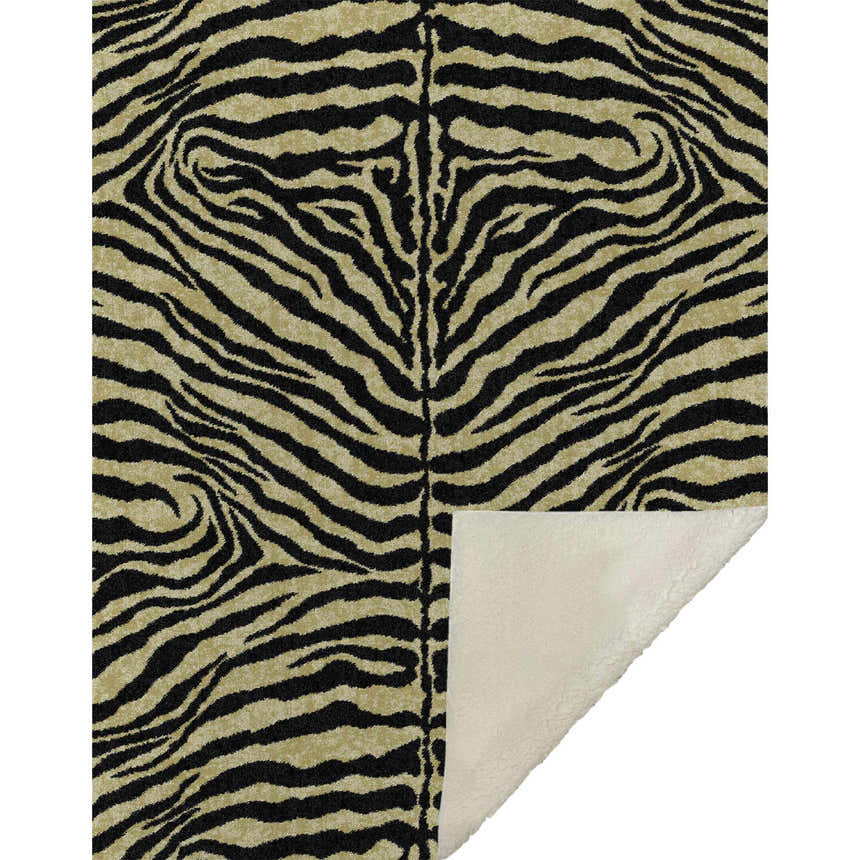 Close-up of the Dalyn Akina AK1 Gold Washable Area Rug, showcasing its black and gold zebra stripe pattern and cotton canvas backing.