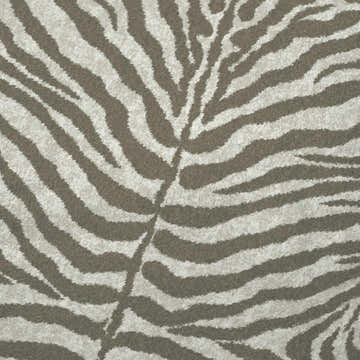 Close-up of the Dalyn Machine Akina AK1 Mocha Washable Area Rug featuring a chestnut and light brown zebra stripe pattern.