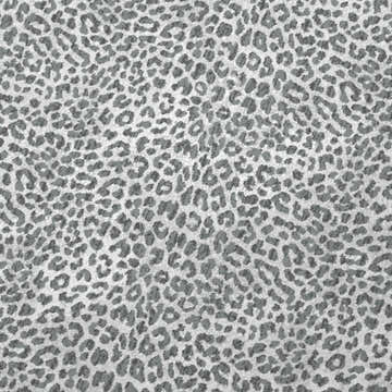 Close-up of Dalyn Machine Akina AK2 Flannel Washable Area Rug, featuring a gray and white animal print pattern.