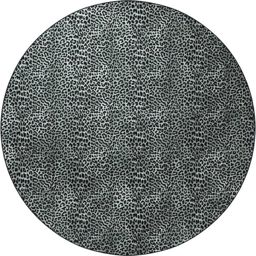 Close-up of the round Dalyn Machine Akina AK2 Midnight Washable Area Rug with a black and taupe animal print.